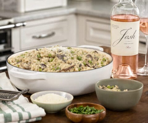 Wild Mushroom Risotto next to a bottle of Josh wines